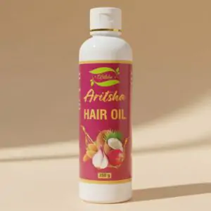 Aritsha Hair Oil in a sleek bottle with a vibrant label, highlighting its botanical formula for hair nourishment